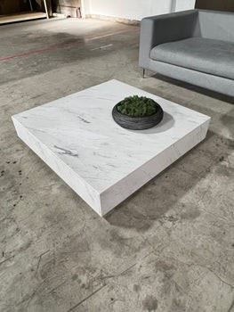 $1300      Rove Concepts Liza Square Marble Coffee Table - HOP10411323-1      Description: This marble coffee table brings form and function to the modern home. With its clean and simple, low-profile design, it anchors any space. Made of beautifully polished Carrara marble and striking matte black metal legs, it creates an airy float-like feel to any living space. Materials: Marble

Dimensions: 40 in x 40 in x 9.4 in Color/Finish: White

Condition: Like new condition. Used only for staging pruposes and in immaculate condition.

Location: Local pick up Portland, OR  97202. Contact us or go to our website and use the 
"Need a shipper" tab to access our list of suggested local and national providers.        https://goodbyhello.com/products/rove-concepts-square-marble-coffee-table-hop10411323-1?_pos=3&_sid=4b46cc3a7&_ss=r