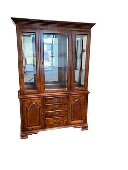 $250 USD     Stanley Furniture China Cabinet Display Hutch MTF153-1      Decsription: Clean and pretty 3 glass panel front illuminated Stanley china cabinet. Single glass front door, 3 lower drawers flanked by 2 lower cabinet doors. Intricate brass toned hardware, illuminated top is enhanced by the mirror back interior, with interior glass shelving. It is in next to perfect condition. 

Dimensions: 50 x 16 x 76 in

Condition: Used and in very good condition. Only minimal signs of any wear associated with use and age. 

Location: Local pick up Portland, OR.  Shipper suggestions available upon request.  Item is in a warehouse with easy bay door access.       https://goodbyhello.com/products/stanley-furniture-china-cabinet-display-hutch-mtf161?_pos=4&_sid=ae19d08a3&_ss=r