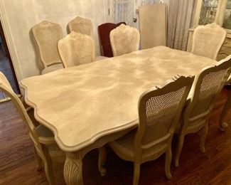 1980s white oak country French style dining room set with six side chairs and two captain's chairs, two leaves and a custom table pad