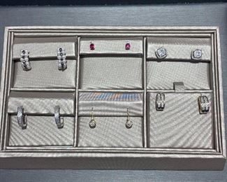 All earrings are either 14k or 10k yellow or white gold with diamonds or Gemstone. 