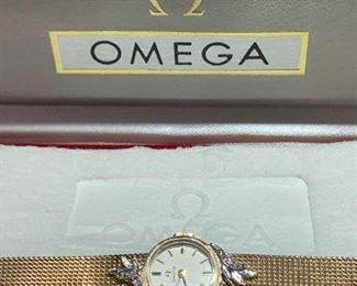 Omega Ladies Watch 
Gold and Diamonds 
