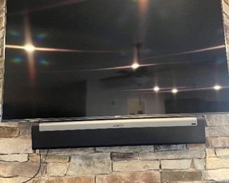 Wall mount Sony smart flatscreen with Sons bar