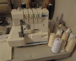 Serger sewing machine with thread, foot pedal, complete