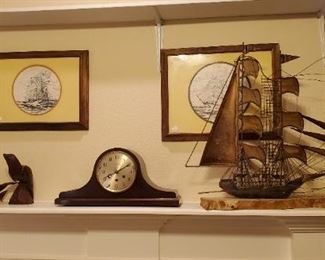 metal ship on marble base