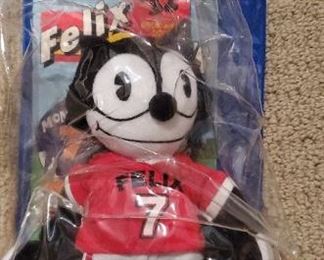 Felix the Cat toy with book