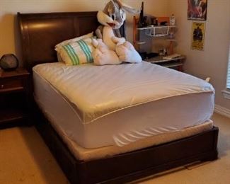 Queen size bed with two drawers on each side