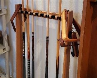 pool table with cue, cue rack and accessories