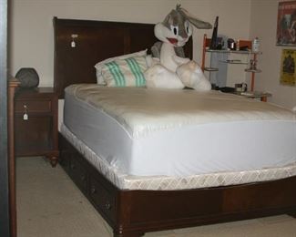 queen size bed with two drawers on each side