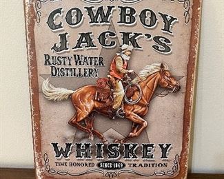 Whiskey advertising tin sign
