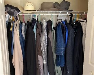 Lots of men’s clothing and cowboy hats