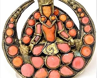 Antique Tibetan Coral Brooch. ........To register and to place bids simply go to www.capitolsalesservices.hibid.com 