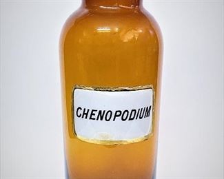 Large amber glass apothecary jar for Chenopodium . ........To register and to place bids simply go to www.capitolsalesservices.hibid.com