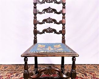 Antique Flemish style hall chair by the Michigan Chair Company of Grand Rapids Michigan. . ........To register and to place bids simply go to www.capitolsalesservices.hibid.com