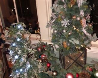 Assorted holiday greenery including Grandin Road garlands.