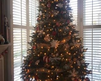 7.5’ Balsom Hill artificial tree with white lights on Rotating stand. Needs pple