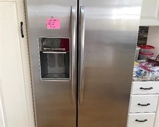 Whirlpool 2013 Stainless side by side refrigerator. Excellent condition!
