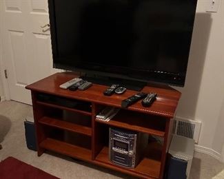 40” Insignia LCDTV, TV stand, Insignia bluray player with wifi, Panasonic 5 disc changer stereo