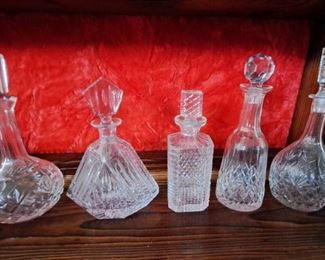 These crystal decanters are very elaborate, 2 have cracks but I don't believe they affect the usage.