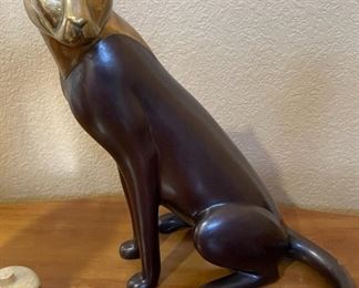 Cheetah bronze seated with polished head  Approx 13" tall.  
