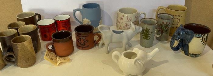 Lots of fun coffee mugs - most of cats and many in boxes