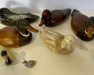 Variety of handmade carved ducks