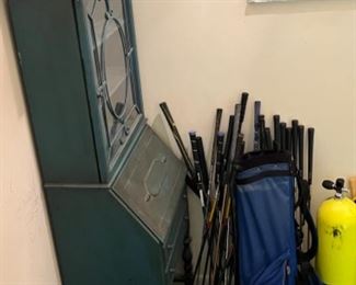 Secretary, golf clubs, dive tank 