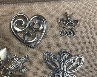 retired james avery sterling items- small open butterfly $69, large lace wing butterfly $159, retired sterling swirl heart pendant -very rare $249   bracelet - is all avery except 1 charm -i have my finger on- see other pics 