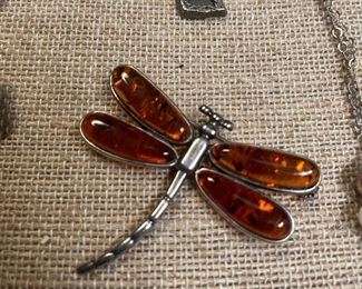 925 marked amber dragonfly brooch $22, 925 cross w/ face of Jesus $22