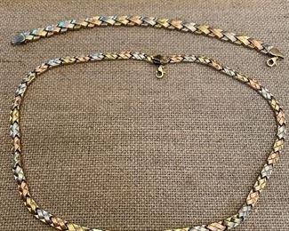 10 k tri color solid gold  have necklace and bracelet -  will weigh out and post prices soon  se next pic for closer details  necklace-9.44gr $299.  bracelet 6.34 gr.$199
