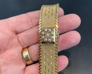 18k gold 65.2 gr.-vintage diamond -watch/bracelet 1950's era- and mint-condition- just a fabulous piece- $3750   this one is also in a vault for the client-  but i thought we  may have  a few buyers that want some real rare special  gold pieces 