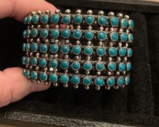 sterling and turquoise cuff- size small-med only - dont  bend this one  :)  heavy and makes a statement -see more pics   amazing  estate piece $175 looks zuni  but not sure 
