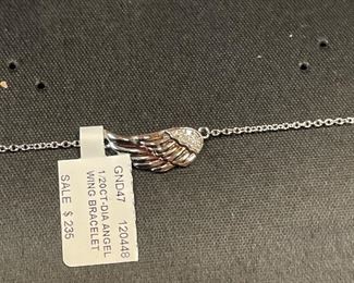 close up of  new 925 wing w/ diamond accents- $49