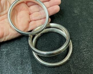  have 3 nice sterling bangles fits small to med size only $24 each or better deal if you take all 
