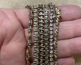 several gold  and diamond bracelets-  AGAIN YOU MUST CALL AND ASK TO SEE THESE I DO NOT CARRY THIS AROUND WITH ME 