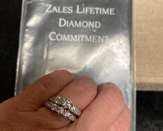 amazing fire in the diamonds on this wedding set w/ all papers from zales- they paid $3000   selling for $1599obo - just a great wedding set without the big price 