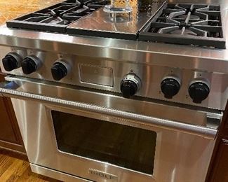 Wolf gas range with 4 burners. 36" wide.  