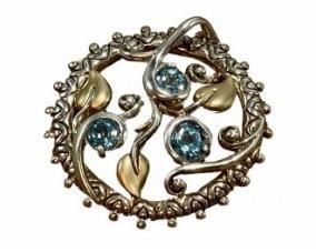 Lot # 31
Barbara Bixby 18K Gold/925 Sterling Silver Pendant W/Blue Topaz Gemstones & Vine Design