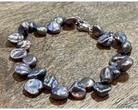 Lot # 68 
Honora Deep Purple, Iridescent Freshwater Keshi Pearl Bracelet With Sterling Clasp. 9 1/2 Inch