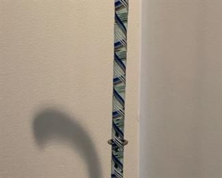 Hand-Blown Antique Glass Cane on Stand. Measures Approximately 36" H. Base Measures 8" x 6.5". Photo 1 of 3.