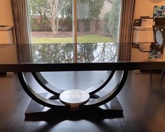 Art-Deco Style Black Lacquer Maple Extension Dining Table. Measures 46" W x 78"L x 30" H with 27" Clearance. Extends to 122" with Two 22" Leaves. Includes Pads. Photo 1 of 5.