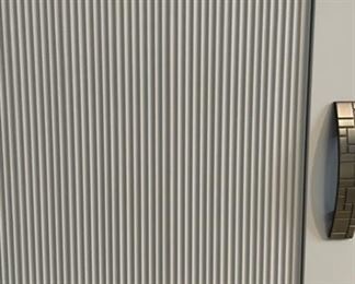 Custom-Built High-Gloss Console with Pencil-Reed Facing, Metal Pulls, Carrera Marble Top and Stainless Steel Legs. Measures 102"W x 18" D x 36" H. Photo 3 of 5.