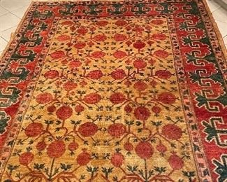 Vintage Khotan Rug. Measure 6.75" x 9.75". Photo 1 of 3.