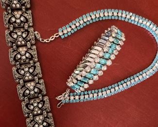 We believe this one of the left is Sterling Silver. 