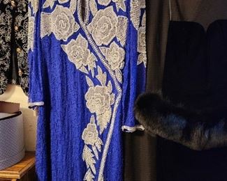 Lots of glamour clothes in various sizes 