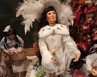 Many 'Native American' style dolls