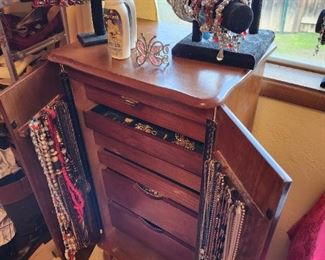 Several standing jewelry cases 