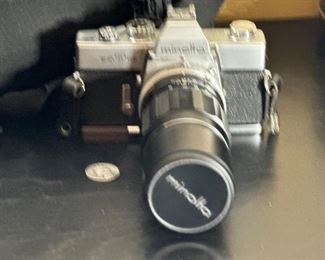 Minolta SRT101 35mm SLR Camera SRT-101 w/ Lens		
