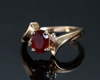 14k Gold Garnet Diamond Ring Size: 8	Size; 8<BR>center stone: 8x6mm	
