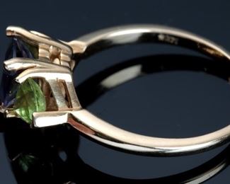 14k Gold Tanzanite & Peridot Trillion Cut Ring	Size: 9.25	

