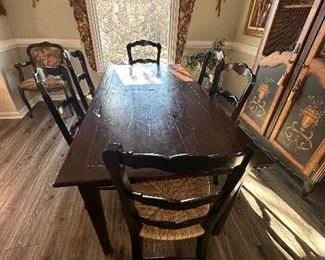 A Dining Room Set with 6 ladder back chairs from Kudzu in Impeccable condition.